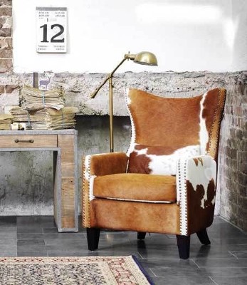 cowhide arm chair.jpg slider